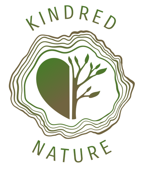 Kindred Nature Logo A logo with half of a heart and half of a tree silhouette within tree rings, and the words Kindred Nature curved around the top and bottom, with a gradient of green and brown colors.